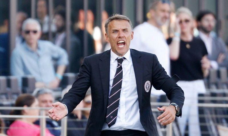 Phil Neville believes David Beckham's son Romeo has the attributes to forge a career in professional football