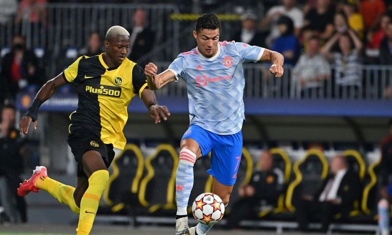 Cristiano Ronaldo battles with Mohamed Ali Camara during Manchester United's defeat against Young Boys
