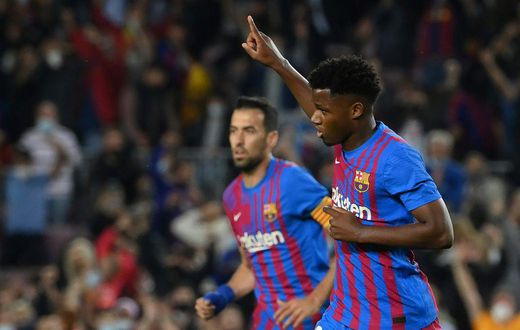 Ansu Fati (R) is leading the next generation of young Barcelona talents.