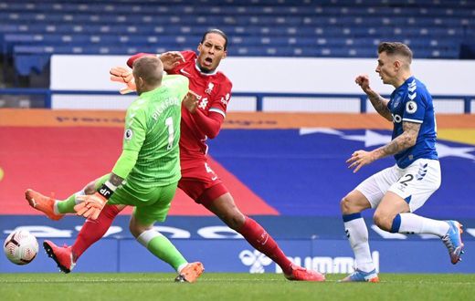 Painful clash: Virgil van Dijk clashed with Everton goalkeeper Jordan Pickford in the Merseyside derby last October