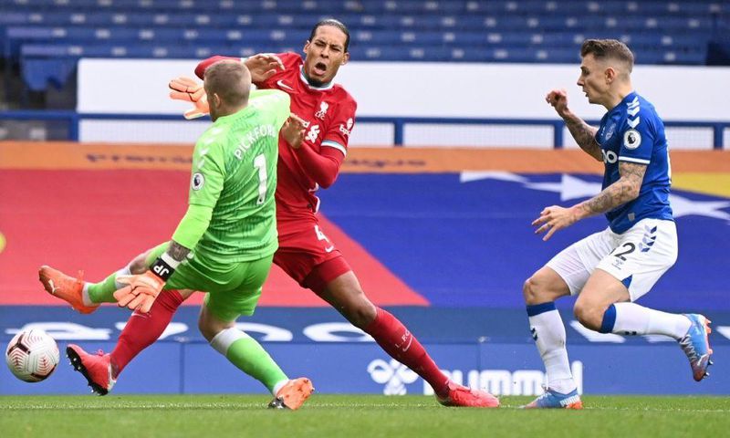 Painful clash: Virgil van Dijk clashed with Everton goalkeeper Jordan Pickford in the Merseyside derby last October