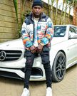 Kenyan musician Willy Pozee in a skinny-jeans look [Instagram: @willy.aul.msafi]