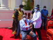 Receiving the Covid-19 booster shot at State house , Nairobi