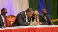 President Uhuru Kenyatta and KRA Commissioner General James Githii Mburu at the 2019 annual taxpayers day