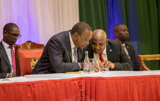 President Uhuru Kenyatta and KRA Commissioner General James Githii Mburu at the 2019 annual taxpayers day