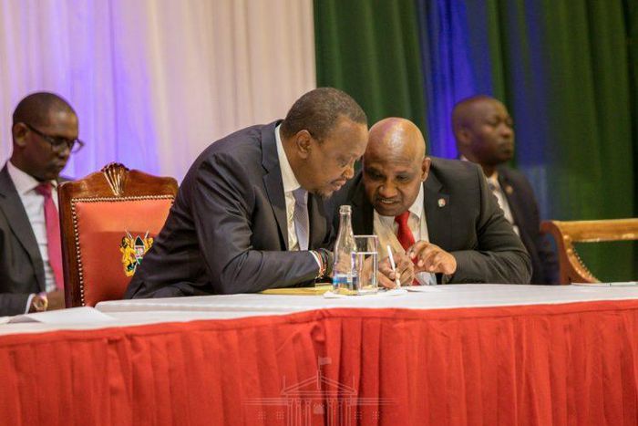 President Uhuru Kenyatta and KRA Commissioner General James Githii Mburu at the 2019 annual taxpayers day