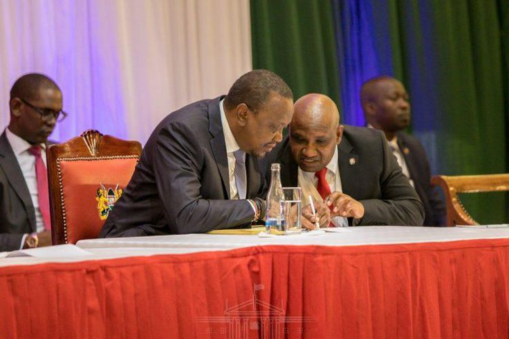 President Uhuru Kenyatta and KRA Commissioner General James Githii Mburu at the 2019 annual taxpayers day