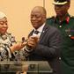Tanzania's Vice President Samia Hassan Suluhu and President John Magufuli taking a call together in July 2019.