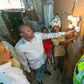 President Uhuru Kenyatta launching electricity at a Kenyan home