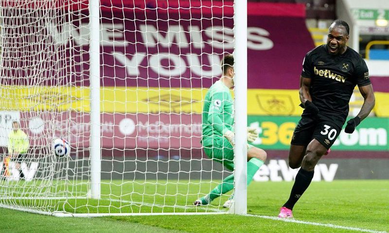 Two good: Michail Antonio (right)scored twice as West Ham beat Burnley 2-1
