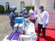 Receiving the Covid-19 booster shot at State house , Nairobi