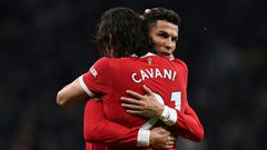 Edinson Cavani and Cristiano Ronaldo celebrate after Cavani scored Manchester United's second goal against Tottenham in a 3-0 win