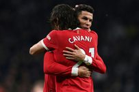 Edinson Cavani and Cristiano Ronaldo celebrate after Cavani scored Manchester United's second goal against Tottenham in a 3-0 win