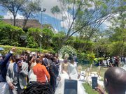 Silas Jakakimba and his bride Florence take vows during their wedding held at the Safari Park Hotel in Nairobi on October 16, 2021