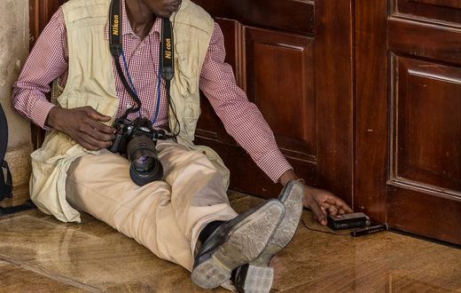 A journalist covering a story during a past event