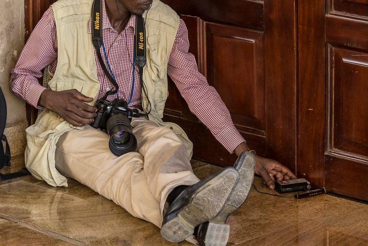 A journalist covering a story during a past event