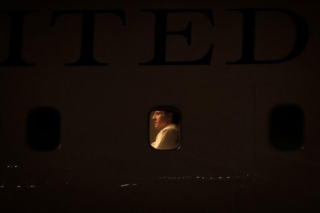 US Secretary of State Antony Blinken is seen in the aircraft as he arrives at Jomo Kenyatta International Airport in Nairobi, Kenya, on November 17, 2021. - Blinken begins his fist trip as US secretary of state to sub-Saharan Africa, Kenya, Nigeria, and Senegal. (Photo by YASUYOSHI CHIBA/AFP via Getty Images)