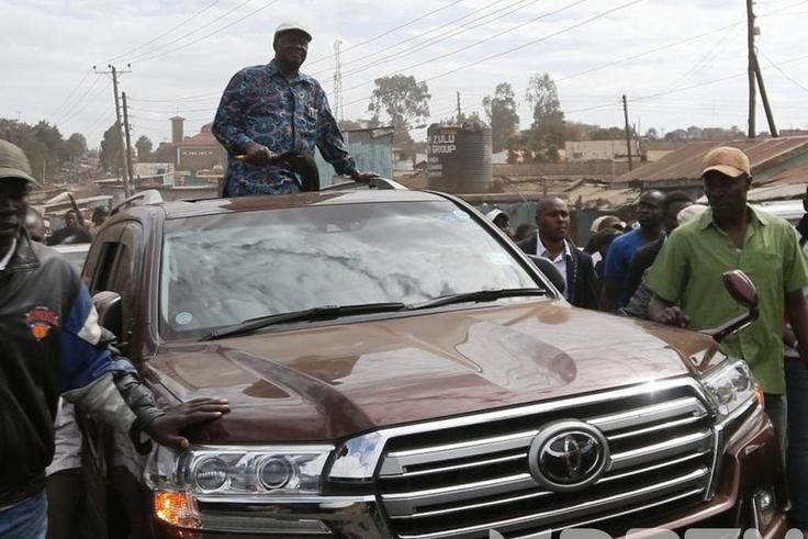 Former Prime Minister Raila Odinga riding in his car