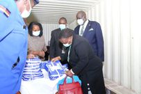 Education CS Prof George Magoha supervises exam materials distribution at the Thika West container