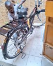 James Kamande admiring his new bike