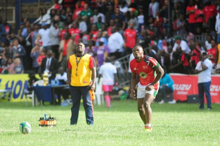 NAIROBI, KENYA - JUNE 30: In this handout image provided by the APO Group, Kenya's Darwin Mukidza takes a conversion as Kenya Simbas beat Zimbabwe Sables 45-36 during the Rugby World Cup qualifier and Rugby Africa Gold Cup match between Kenya and Zimba...