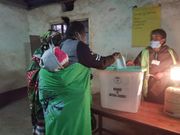 A voter casts a ballot during the Bonchari by-election