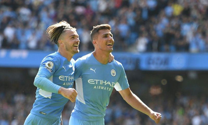 Rodrigo (right) scored Manchester City's fourth goal as they thrashed Arsenal