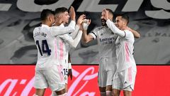 Real Madrid players celebrate after Karim Benzema's brilliant opening goal against Barcelona in the Clasico