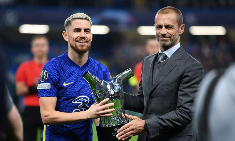 Chelsea midfielder Jorginho is presented with the UEFA men's player of the year award