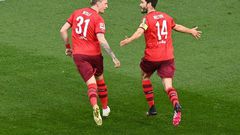 Cologne captain Jonas Hector (R) celebrates scoring the winning goal at home to RB Leipzig