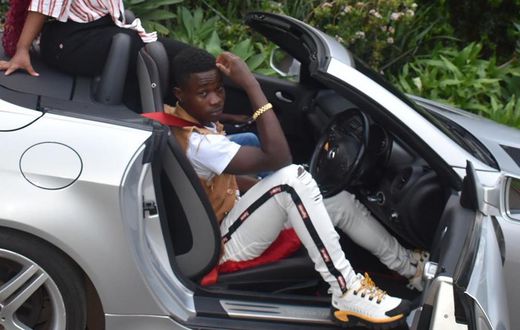 Governor Sonko gifts adopted son Gift Osinya brand new Mercedes Benz as he turns 19 (Photos)