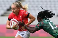 Britain's Emma Uren (L) is tackled by Kenya's Diana Ochieng during the women's pool A rugby sevens match between Britain and Kenya during the Tokyo 2020 Olympic Games at the Tokyo Stadium in Tokyo on July 30, 2021. (Photo by GREG BAKER / AFP) (Photo by GREG BAKER/AFP via Getty Images)
