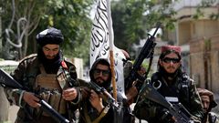 Taliban fighters display their flag on patrol in Kabul, Afghanistan, on Thursday, Aug. 19, 2021.