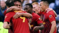 Real Salt Lake's Bobby Wood is congratulated by teammates after scoring the injury-time winner in a 2-1 MLS Cup playoff win over Sporting Kansas City