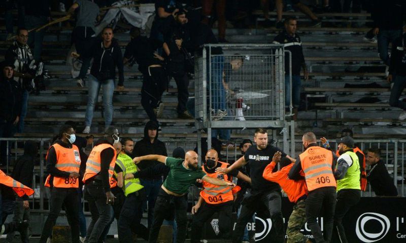 Marseille supporters clashed with opposing supporters and security staff at Angers' stadium