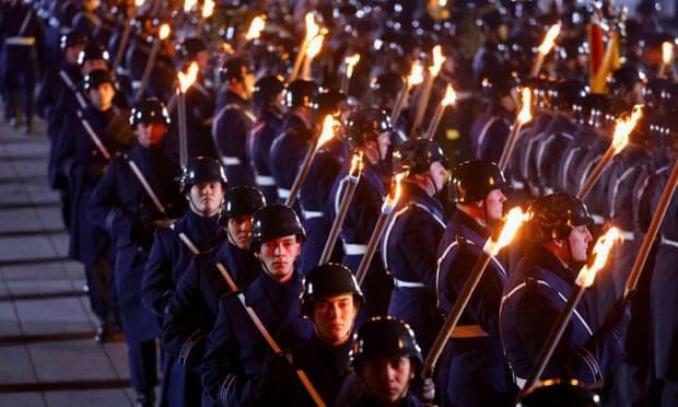 Members of Germany’s military on parade at Chancellor Angela Merkel’s outgoing ceremony on Thursday.Credit...Hannibal Hanschke/Reuters