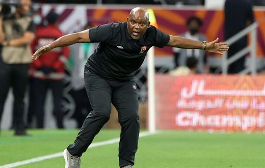 Al Ahly of Egypt coach Pitso Mosimane reacts during the CAF Super Cup match against Raja Casablanca of Morocco in Qatar on December 22.