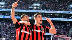 Leverkusen's Czech forward Patrik Schick (R) scored four goals on Saturday