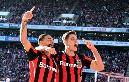 Leverkusen's Czech forward Patrik Schick (R) scored four goals on Saturday