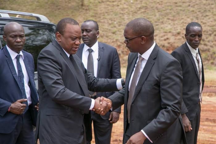 President Uhuru Kenyatta (left) and State House Chief of Staff Nzioka Waita (right)