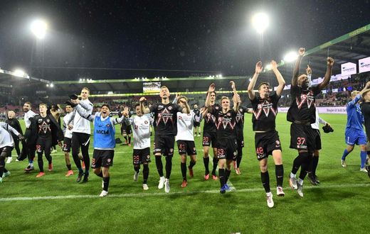 Danish delight: Midtjylland's players celebrate after defeating Celtic