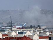 Smoke rises from a deadly explosion outside the airport in Kabul, Afghanistan, Thursday, Aug. 26, 2021.