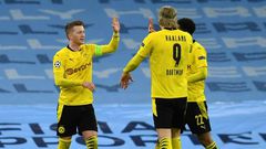 Borussia Dortmund captain Marco Reus (L) celebrates his goal at Manchester City in Tuesday's 2-1 away defeat