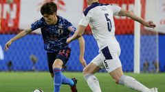 Japan star Kyogo Furuhashi (L)