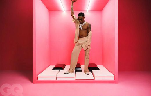 Wizkid in shirts and pants from MM6 Maison Margiela [GQ]
