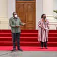 President Uhuru Kenyatta, Paul Tergat and Sports CS Amina Mohamed handing over the national flag to Team Kenya for the 2020 Tokyo Olympic games