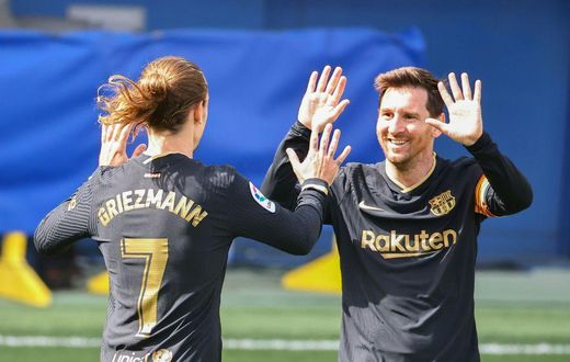 Antoine Griezmann (left) scored twice as Barcelona beat Villarreal 2-1 on Sunday