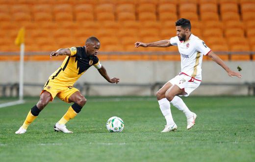 Bernard Parker (L) playing for Kaizer Chiefs against Wydad Casablanca of Morocco in a 2021 CAF Champions League semi-final in Johannesburg.