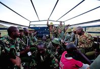 Kenyan Police officers in an army truck leave the site on November 15, 2012 where the mass killings of police took place in Samburu north district near Baragoi . Some of the remaining four bodies were found close to where the ambush took place by alleged Turkana cattle rustlers.  Ivan Lieman/AFP via Getty Images)