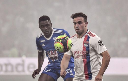 Swiss winger Xherdan Shaqiri (R) made his first appearance for Lyon since joining from Liverpool